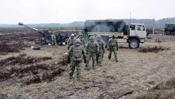 Los militares de la OTAN durante las maniobras en Letonia - Sputnik Mundo