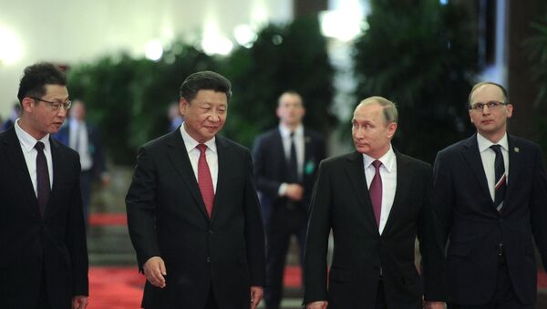 Presidente de Rusia, Vladímir Putin y presidente de China, Xi Jinping - Sputnik Mundo