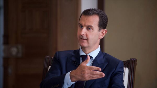 Bashar Asad, presidente de Siria, durante la entrevista - Sputnik Mundo