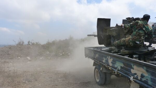 El Ejército sirio durante los combates  en la provincia de Hama (archivo) - Sputnik Mundo