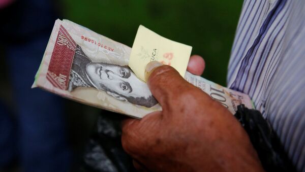 Billetes de bolívares venezolanos (archivo) - Sputnik Mundo