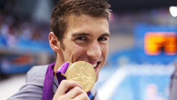 Michael Phelps, nadador estadounidense, durante los JJOO de 2012 en Londres - Sputnik Mundo
