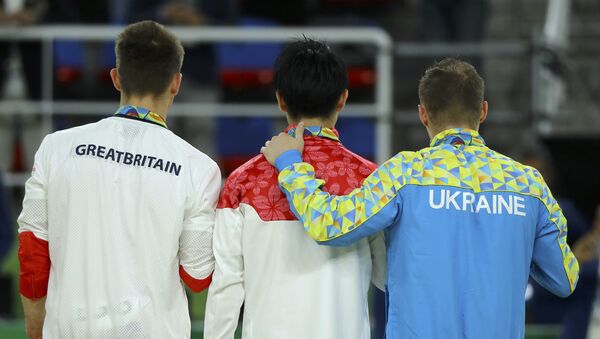 Los atletas de Ucrania y Japón - Sputnik Mundo
