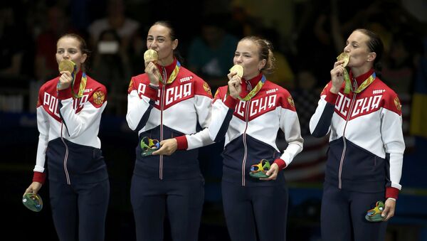 Deportistas rusas con medallas de oro - Sputnik Mundo