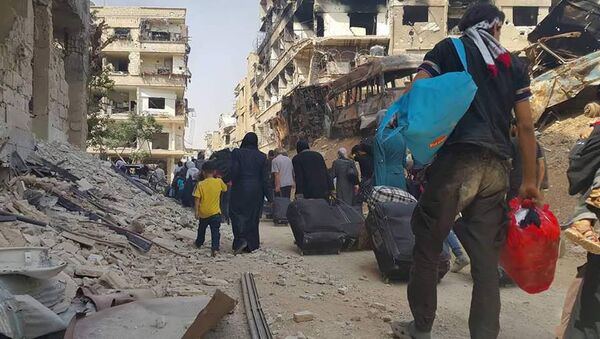 Evacuación de la población civil de la ciudad de Daraya - Sputnik Mundo
