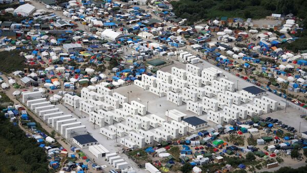 El campamento de refugiados en Calais, Francia (archivo) - Sputnik Mundo