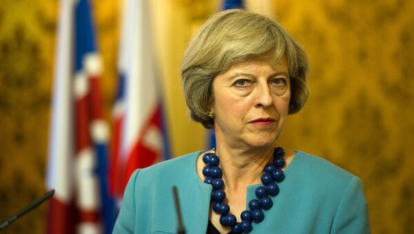British Prime Minister Theresa May listens to journalists questions during a press conference after her meeting with Slovak Prime Minister, in Bratislava on July 28, 2016. - Sputnik Mundo