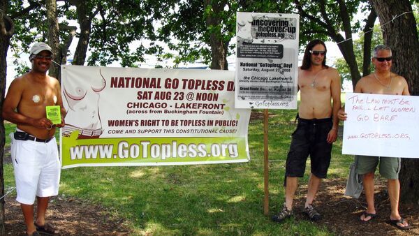 La marcha 'Go Topless Day' - Sputnik Mundo