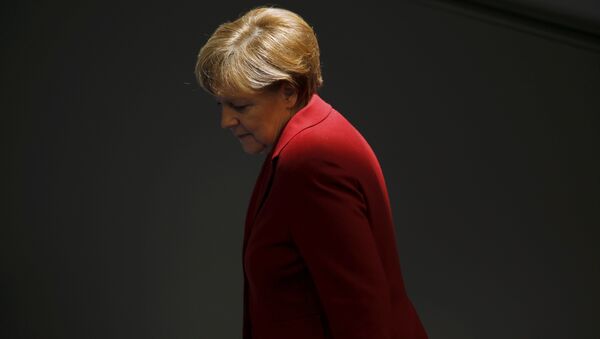File photo of German Chancellor Angela Merkel attending a debate at the Bundestag, the lower house of parliament, in Berlin March 19, 2015 - Sputnik Mundo