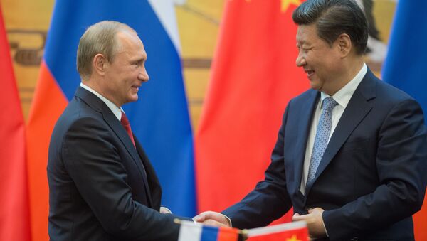 El presidente de Rusia, Vladímir Putin, junto a su homólogo chino, Xi Jinping (archivo) - Sputnik Mundo