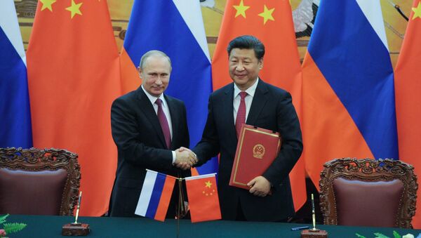 El presidente de Rusia, Vladímir Putin, y el presidente de China, Xi Jinping - Sputnik Mundo