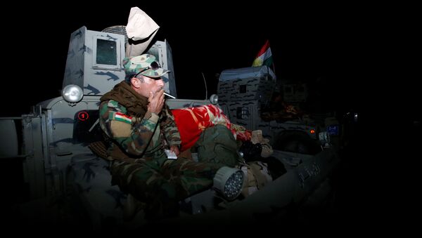 Combatientes de peshmerga durante las preparaciones del ataque en Mosul, Irak - Sputnik Mundo
