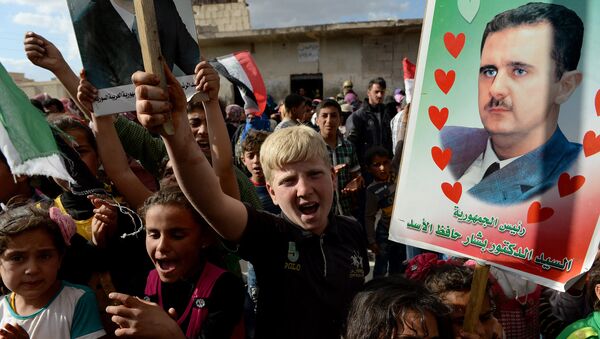 Partidarios de Bashar Asad en la ciudad de Hama - Sputnik Mundo