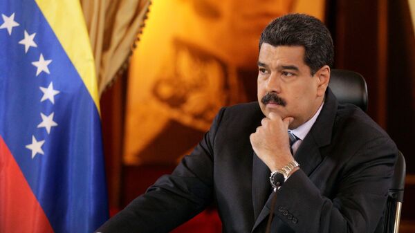 Venezuela's President Nicolas Maduro attends an agreement signing ceremony with representatives of oil companies: Venezuelan Delta Petroleum and India's ONGC Videsh Limited - Sputnik Mundo