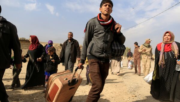 Los civiles en Mosul, Irak - Sputnik Mundo