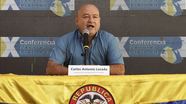 Commander Carlos Antonio Lozada, member of the direction of the Revolutionary Armed Forces of Colombia (FARC), speaks during the 10th National Guerrilla Conference in Llanos del Yari, Caqueta department, Colombia, on September - Sputnik Mundo