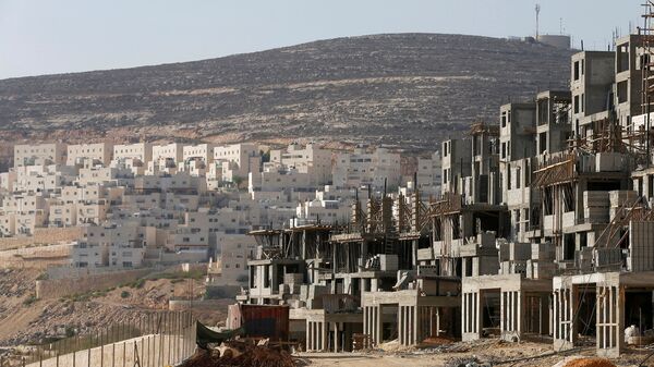 Construcción de viviendas para colonos judíos en Jerusalén (archivo) - Sputnik Mundo