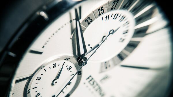 Un reloj - Sputnik Mundo