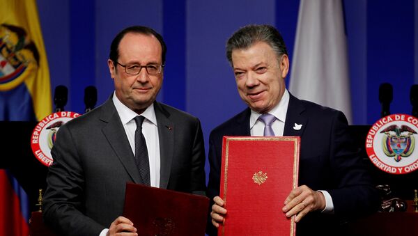 Francois Hollande, presidente de Francia, y Juan Manuel Santos, presidente  de Colombia - Sputnik Mundo