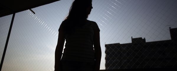 Silueta de una mujer (imagen referencial) Silueta de una mujer (imagen referencial) - Sputnik Mundo