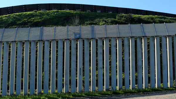 The border wall separating the United States and Mexico is pictured in San Ysidro, California. - Sputnik Mundo