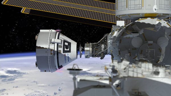 This artist's concept shows Boeing’s CST-100 Starliner spacecraft, currently under development for NASA’s Commercial Crew Program, docking to the International Space Station - Sputnik Mundo
