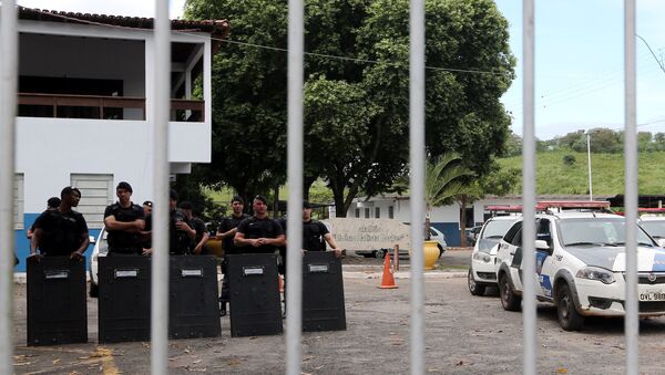 Police officers stand inside their headquarters in Cachoeira do Itapemirim, Espirito Santo, Brazil - Sputnik Mundo