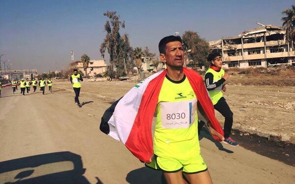Jóvenes iraquíes corren un maratón solidario entre Bagdad y Mosul - Sputnik Mundo