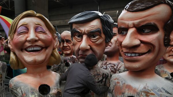 Figuras de los candidatos presidenciales de Francia: Marine Le Pen, François Fillon y Emmanuel Macron - Sputnik Mundo