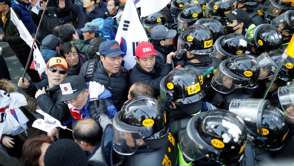 Los protestas en Seúl - Sputnik Mundo