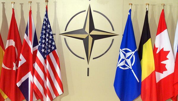 Banderas nacionales en la sede de la OTAN - Sputnik Mundo