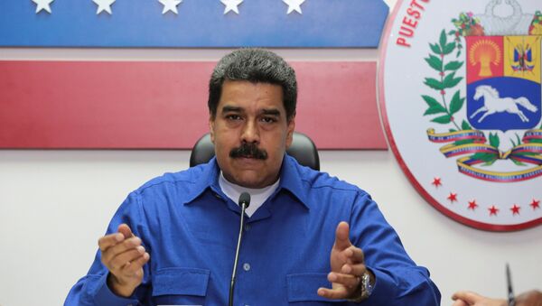 Venezuela's President Nicolas Maduro speaks during a meeting with ministers in Caracas, Venezuela - Sputnik Mundo
