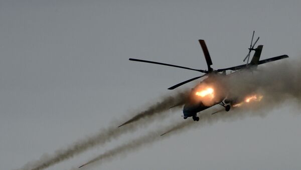 Helicóptero ruso Mi-35 en acción - Sputnik Mundo