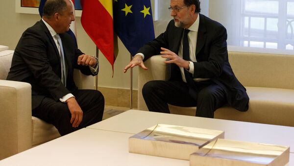 El presidente del Gobierno español, Mariano Rajoy, con el presidente de Costa Rica, Luis Guillermo Solís - Sputnik Mundo