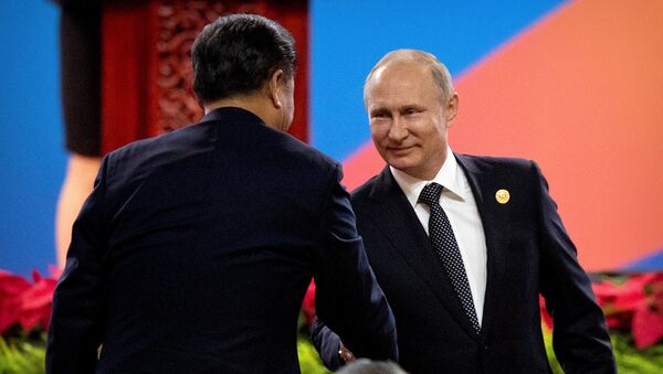 Xi Jinping, presidente de China y Vladímir Putin, presidente de Rusia - Sputnik Mundo