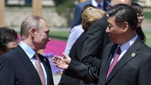 Vladímir Putin, presidente de Rusia, y Xi Jimping, presidente de China - Sputnik Mundo