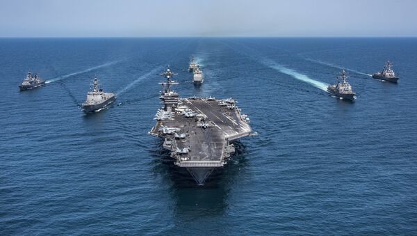 In this image released by the U.S. Navy, the aircraft carrier USS Carl Vinson, flanked by South Korean destroyers, from left, Yang Manchun and Sejong the Great, and the U.S.Navy's Wayne E. Meyer and USS Michael Murphy, transit the western Pacific Ocean Wednesday, May 3, 2017. - Sputnik Mundo