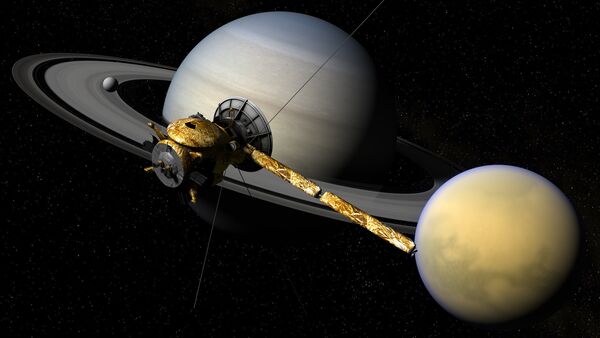 Ilustración gráfica de la sonda Cassini, el planeta Saturno y su satélite Titan - Sputnik Mundo