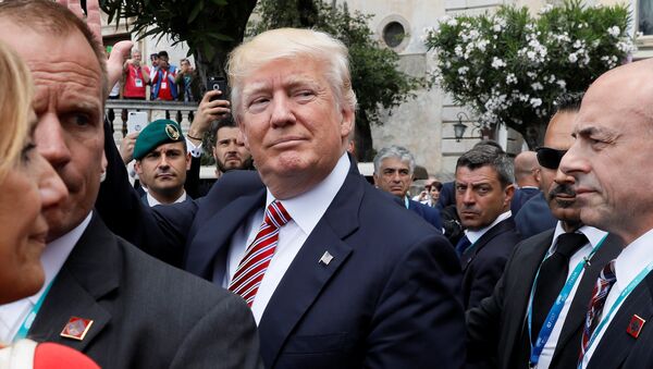 Donald Trump, presidente de EEUU, durante la cumbre del G7 en Italia - Sputnik Mundo