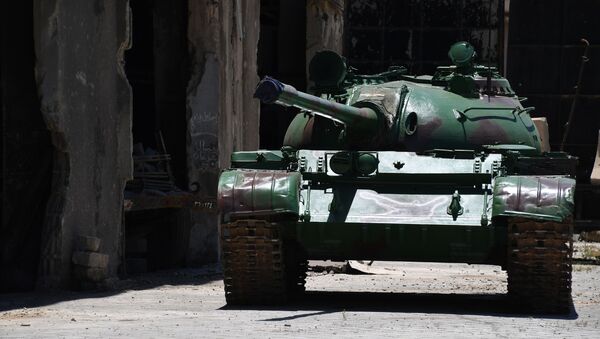 Восстановленный танк Т-55 на территории завода по ремонту и восстановлению бронетанковой техники в Дамаске - Sputnik Mundo