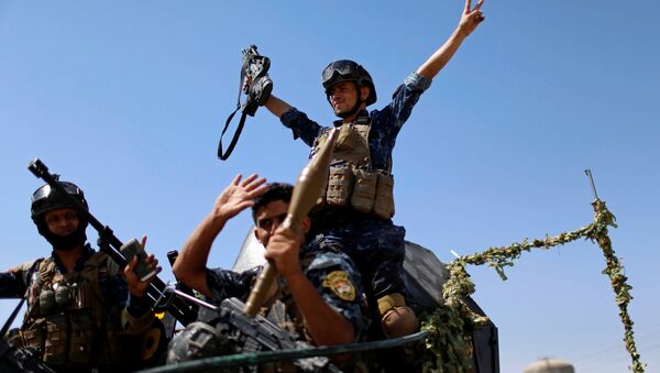 Militares iraquíes durante la liberación de Mosul, Irak - Sputnik Mundo