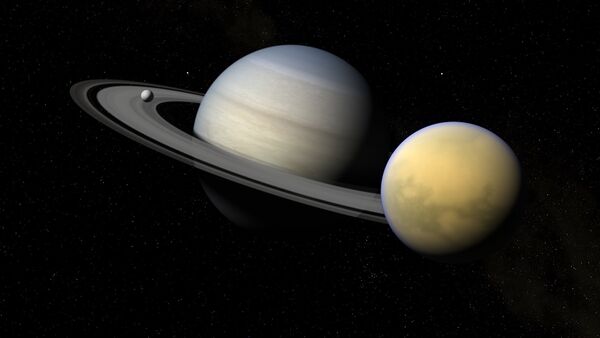 Saturno y sus satélites Titán y Encélado - Sputnik Mundo