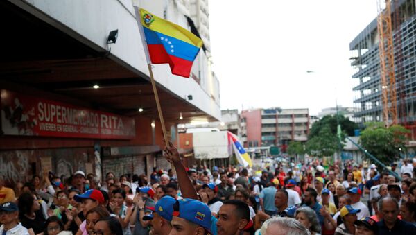 Simpatizantes de la oposición venezolana en Caracas - Sputnik Mundo