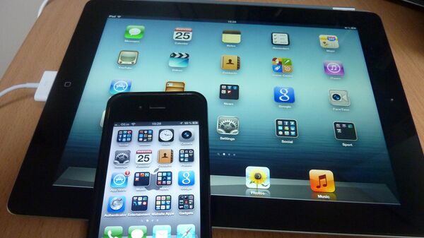 iPad y iPhone - Sputnik Mundo