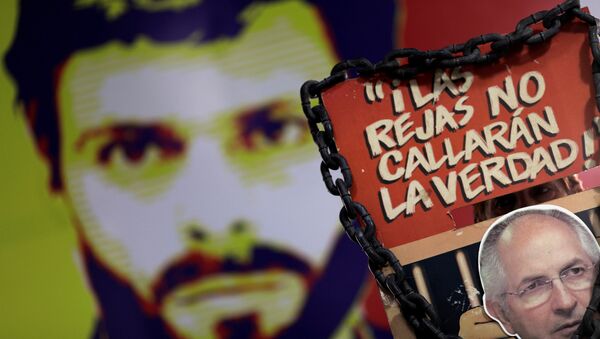 Un cartel con el retrato de Leopoldo López - Sputnik Mundo