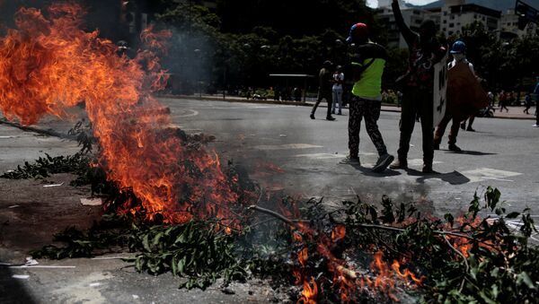 Protestas en Caracas, la capital de Venezuela - Sputnik Mundo