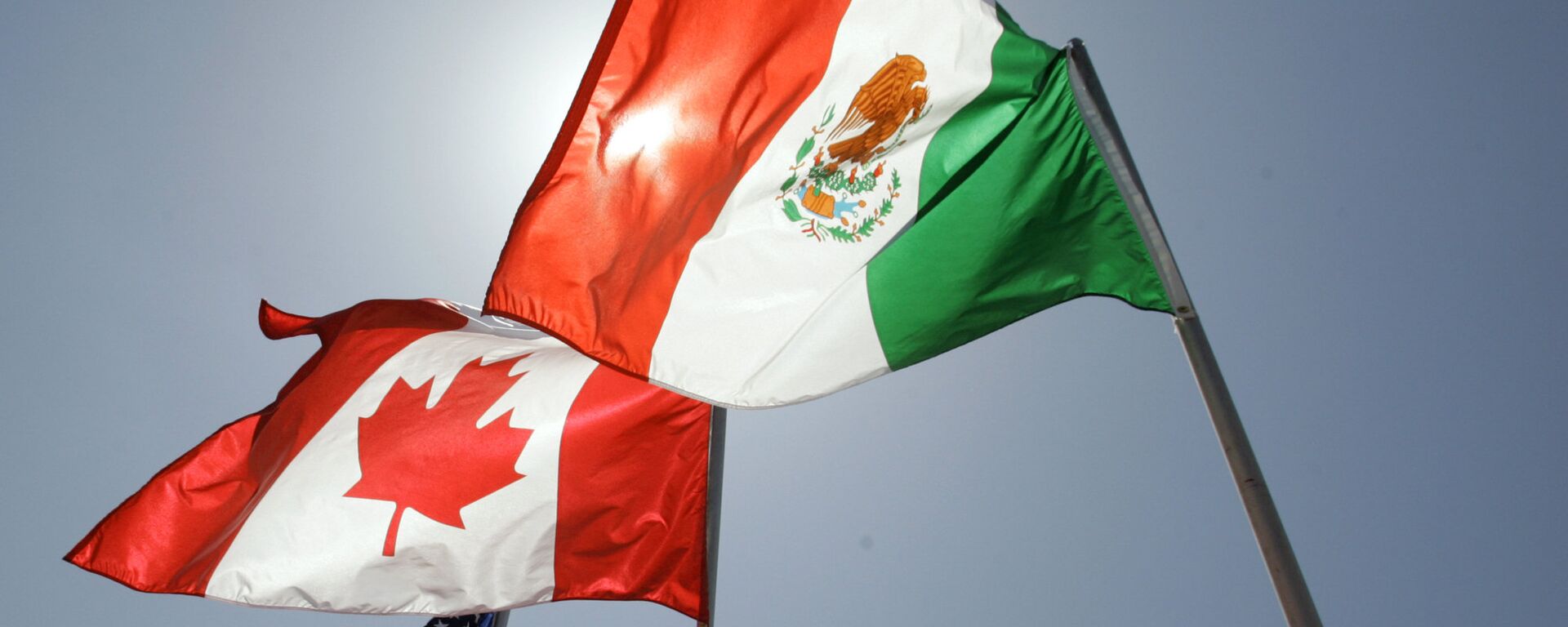 Las banderas de EEUU, Canadá y México - Sputnik Mundo, 1920, 12.10.2021