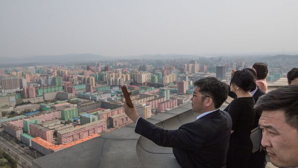 Los turistas en Pyongyang, Corea del Norte - Sputnik Mundo