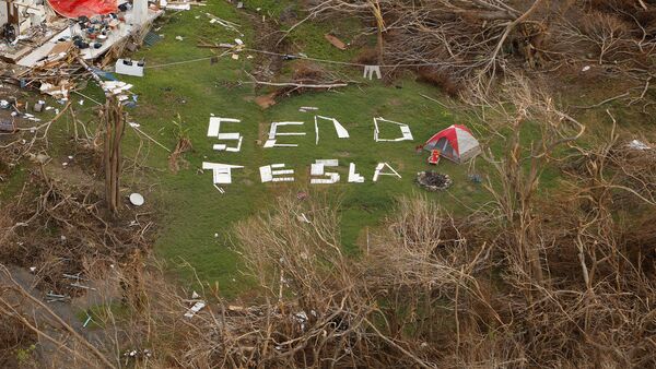 A sign reading Send Tesla on the osland of St. John, U.S. Virgin Island - Sputnik Mundo