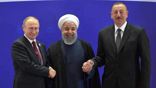 Presidente ruso, Vladímir Putin, presidente de Irán, Hasán Rohaní y presidente azerbaiyano, Ilham Aliyev - Sputnik Mundo
